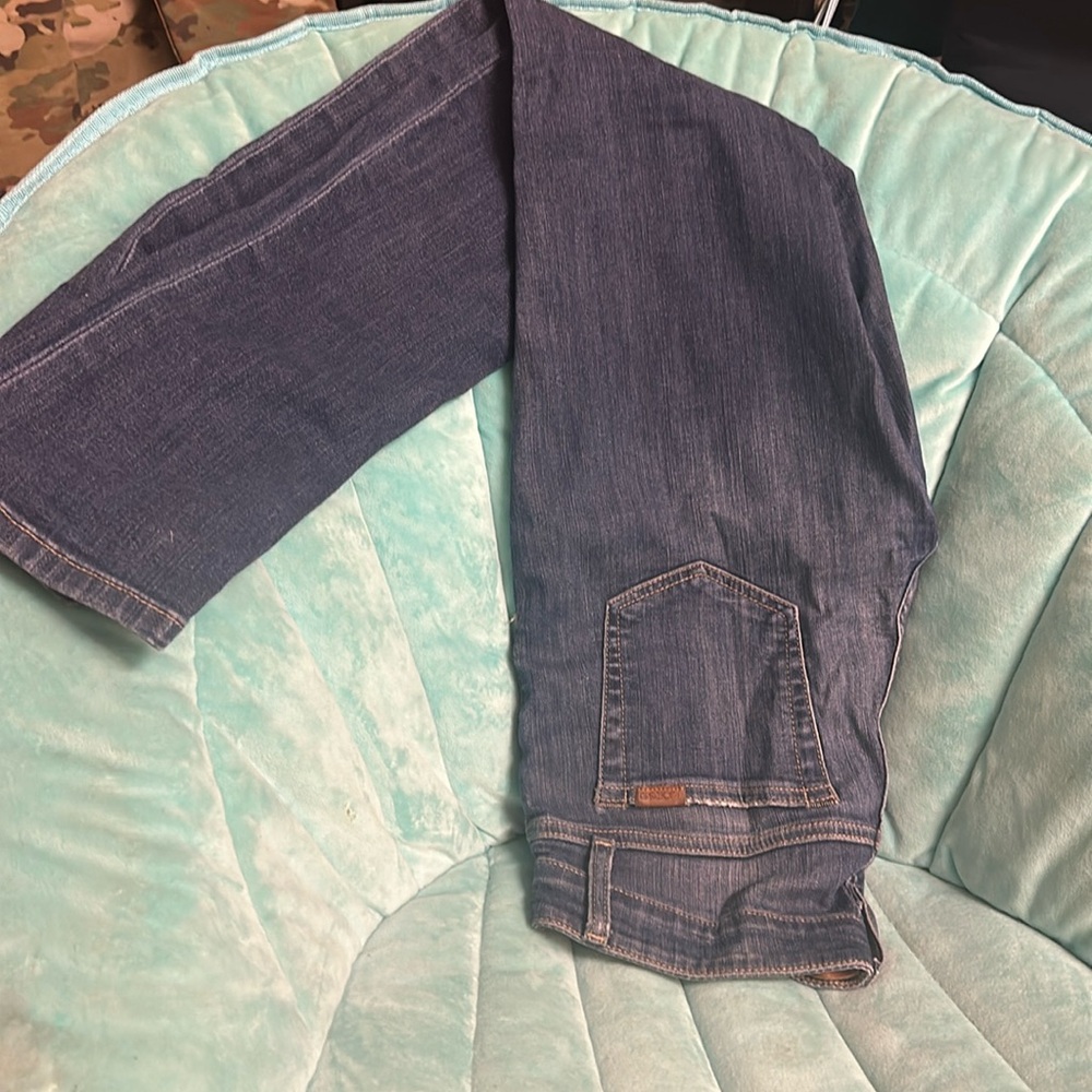 Dark wash mid rise skinny blue jeans